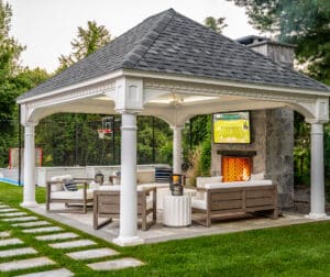 Gazebo with outdoor fireplace in Andover, Massachusetts. Patio and Fireplace masonry designed and built by Dex by Terra.